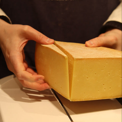 Hand-cut AlpenCheddar, a British artisan cheese from Rennet & Rind.