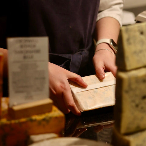 Cropwell Bishop Shropshire Blue carefully wrapped after hand cutting at Rennet & Rind.