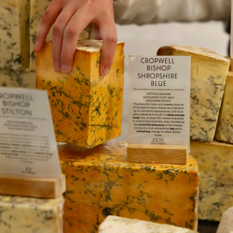 Cropwell Bishop Shropshire Blue artisan cheese on the Rennet & Rind cheese counter.