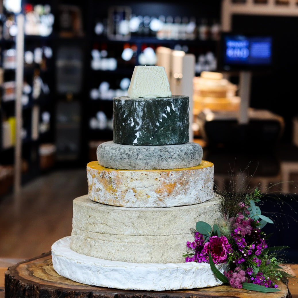 Granchester cheese tower with six tiers of British artisan cheese for large wedding