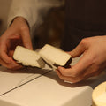 Freshly cut Eve artisan goats cheese ready for sale at Rennet & Rind.