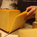 Fresh Mayfield, British artisan cheese being cut to order at Rennet & Rind.