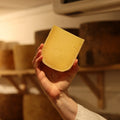 British Artisan Cheese Old Winchester being held by cheesemonger at Rennet & Rind