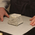 British Artisan Sheep's milk Cheese Pave Cobble being wrapped by cheesemonger at Rennet & Rind 