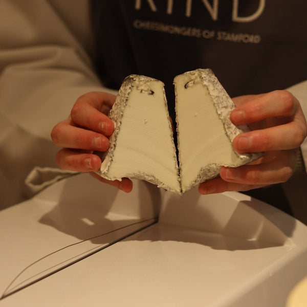 Freshly cut Tor goats cheese, a british artisan cheese from Rennet & Rind