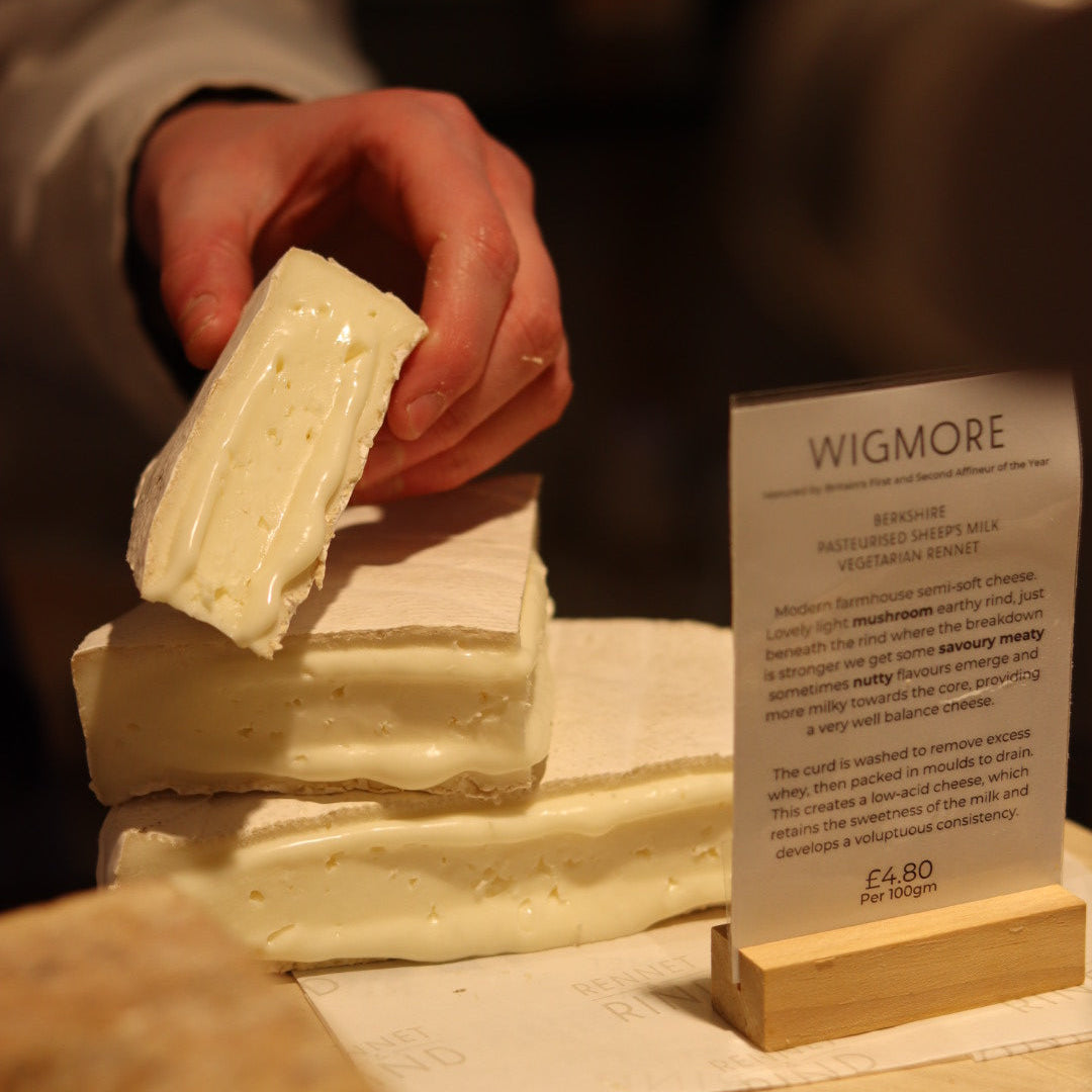 British artisan cheese Wigmore displayed on cheese counter at Rennet & Rind