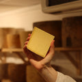 British artisan cheese Yoredale Wensleydale being held by Rennet & Rind cheesemonger